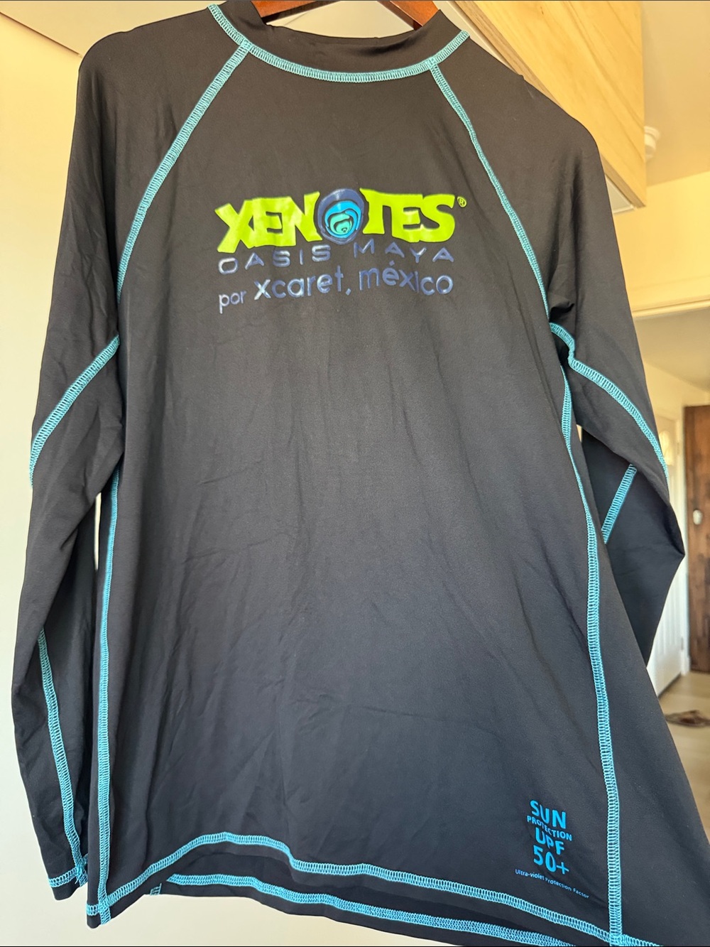 Xcaret Xenotes Black Long-Sleeve UPF 50+ Rash Guard with Teal Stitching Unisex